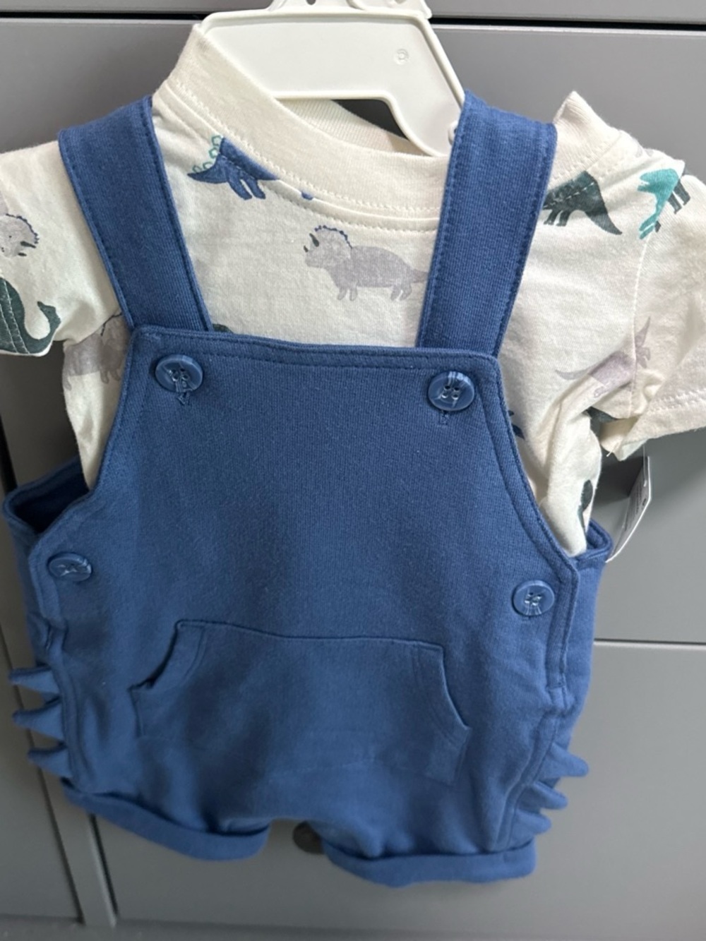 Carter's Cream and Blue Baby Outfit Tag Detail